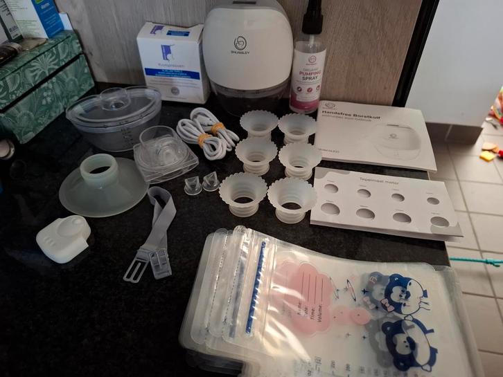 snuggley handsfree borstkolf, Kinderen en Baby's, Babyvoeding en Toebehoren, Zo goed als nieuw, Borstkolf, Ophalen of Verzenden