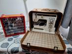 Naaimachine in koffer en klosjes garen., Ophalen, Gebruikt