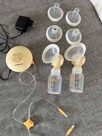 Medela swing maxi + opzetstukken beschikbaar voor biedingen