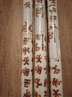 3 tollen kaftpapier met etiketten De Kleine Robbe, Ophalen