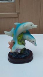 Een beeldje met 2 dolfijnen kleur wit en licht blauw en zwar, Comme neuf, Enlèvement