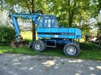Grote zware graafmachine kraan met NL kenteken, Ophalen, Graafmachine
