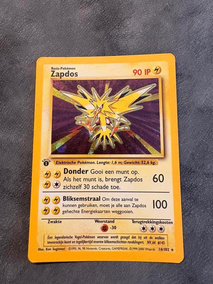 Zapdos 1st Edition 16/102 Dutch - Base Set - Pokémon, Hobby en Vrije tijd, Verzamelkaartspellen | Pokémon, Zo goed als nieuw, Ophalen of Verzenden