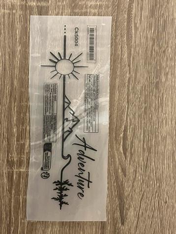 Sticker “Adventure beschikbaar voor biedingen