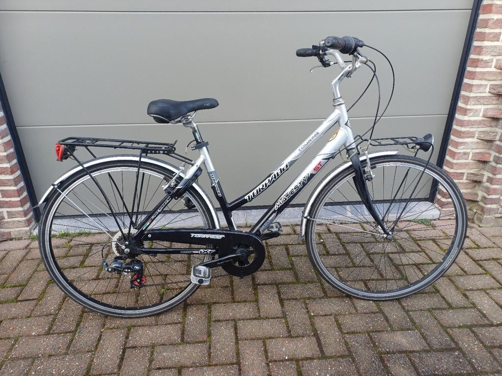 Damesfiets met 7versnellingen, Ophalen