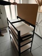 Stapelrek gebruikt om schoenen op te zetten, Ophalen