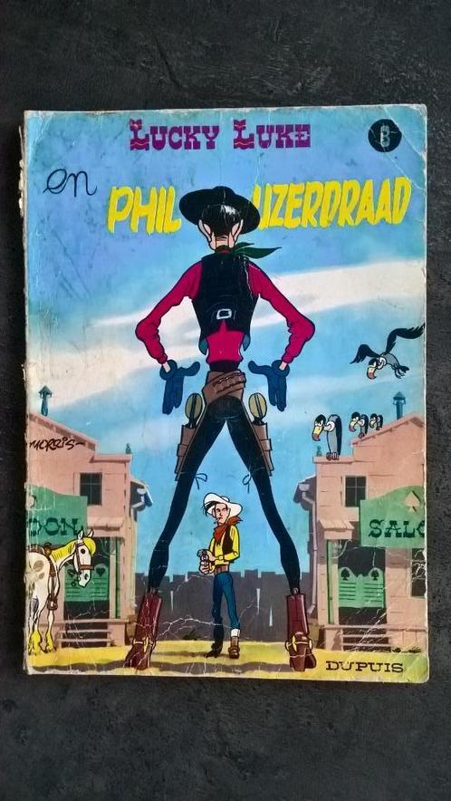 Strip Lucky Luke - Phil ijzerdraad Nr 8, Boeken, Stripverhalen, Gelezen, Eén stripboek, Ophalen of Verzenden