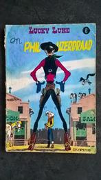 Strip Lucky Luke - Phil ijzerdraad Nr 8, Livres, BD, Une BD, Utilisé, Enlèvement ou Envoi