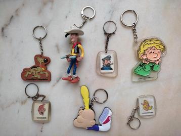 7 porte-clefs sur le thème de la bande dessinée (pièce/lot) beschikbaar voor biedingen