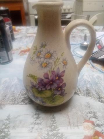 Cruche poterie fleurs, Enlèvement