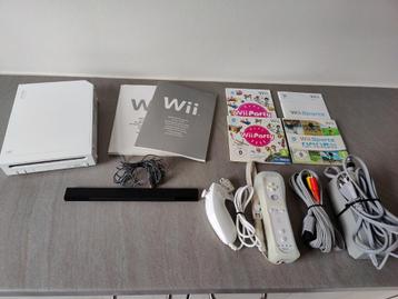 Nintendo Wii + Controller + Nunchuck +	Wii Sports en Wii Par beschikbaar voor biedingen
