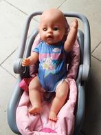 Baby born met maxi cosi en slaapzak, Ophalen