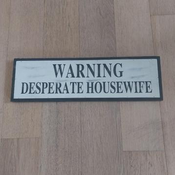 decoratief wandbord "desperate housewife" beschikbaar voor biedingen
