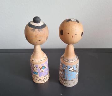 Joli couple kokeshi avec scène égyptienne