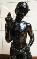 Beeld van mijnwerker, Ophalen