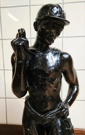 Beeld van mijnwerker beschikbaar voor biedingen