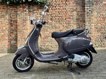 Vespa bromfiets 125 LX in nieuwe staat! disponible aux enchères