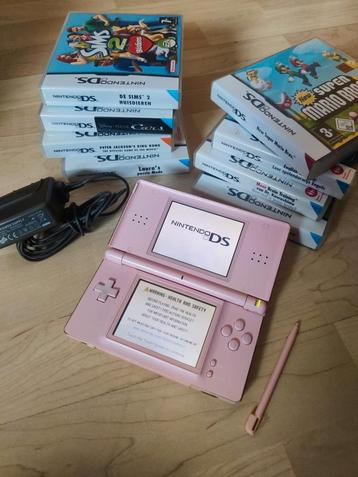 Nintendo ds roze met 8 spellen beschikbaar voor biedingen