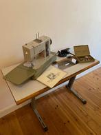 machine à coudre Bernina et sa table, Ophalen