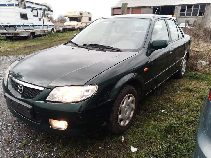 Mazda 323.1,3i.essence. 2002. En bon état générale,, Auto's, Mazda, Particulier, Benzine, Euro 3, Berline, 5 deurs, Handgeschakeld