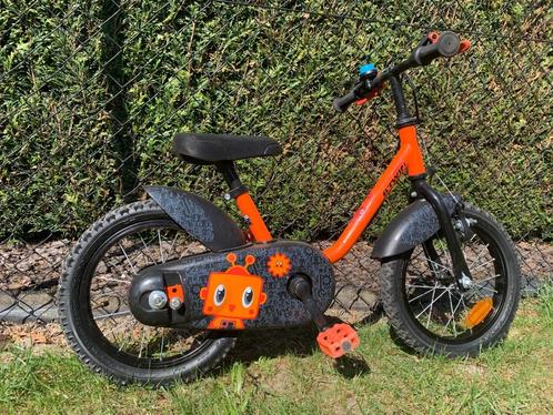 Oranje B-TWIN kinderfietsje met 14" banden., Fietsen en Brommers, Fietsen | Kinderfietsjes, Gebruikt, Minder dan 16 inch, Ophalen