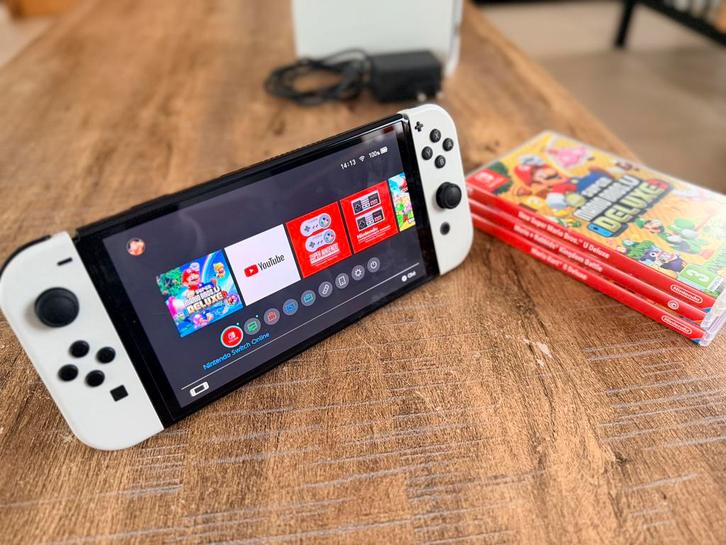 Nintendo Switch OLED + 3 games + extra – Zeer goede staat, Consoles de jeu & Jeux vidéo, Jeux | Nintendo Switch, Comme neuf, Enlèvement