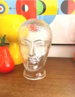 Glazen hoofd jaren 70, Ophalen