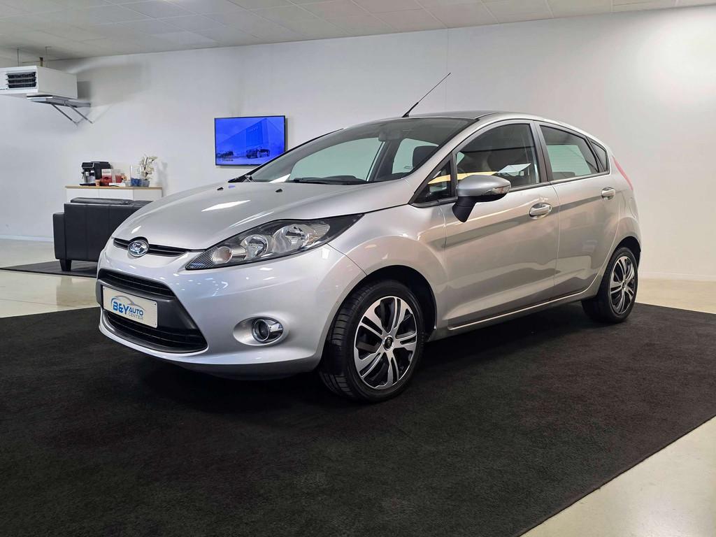 Ford Fiesta 1.25i Ghia - Benzine - Airco (bj 2011), Voorwielaandrijving, Euro 5, Stof, 4 cilinders