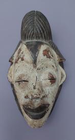 Afrikaanse masker, Ophalen