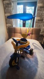 Kinderdriewieler met duwstang, Ophalen