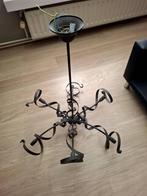 Gietijzeren luster, Ophalen