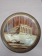 Decoratieve wandplaat met reliëf, Ophalen