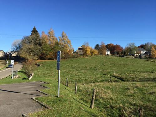 Villabouwgrond met achtergrond te koop in Vaux-sur-Sûre, Immo, Gronden en Bouwgronden, 1500 m² of meer