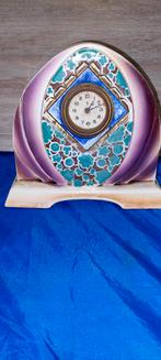 Horloge art déco en céramique — années 1930, Enlèvement