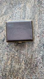 Porte-cigarettes vintage, Enlèvement