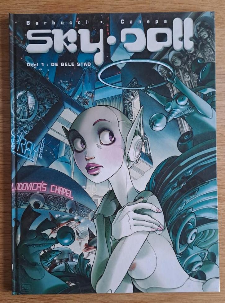 1 - Sky-Doll - De Gele Stad, Livres, BD, Comme neuf, Une BD, Enlèvement ou Envoi
