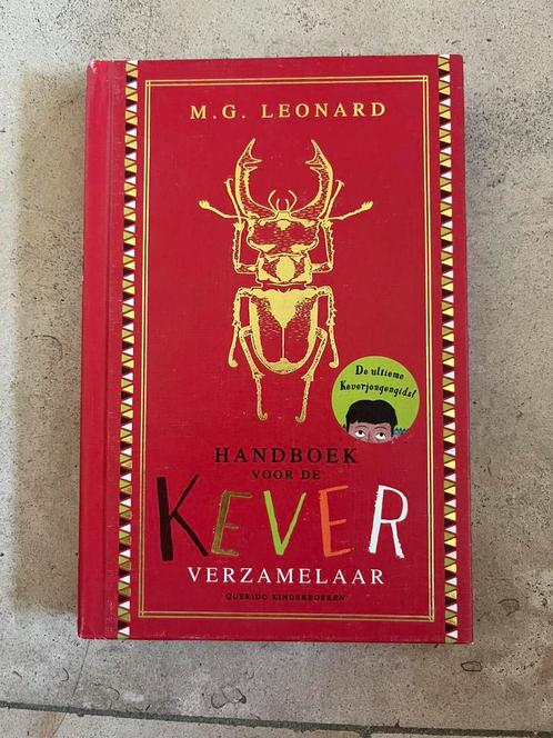 M.G. Leonard - Handboek voor de keververzamelaar, Boeken, Kinderboeken | Jeugd | 13 jaar en ouder, Zo goed als nieuw, Fictie, Ophalen