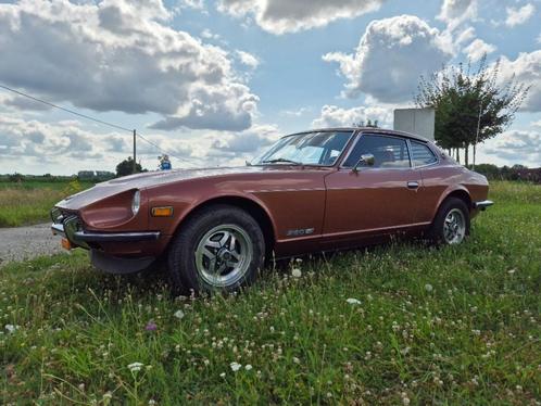 DATSUN 260Z 1975 5 bak 112.000km  Top Conditie., Auto's, Oldtimers, Particulier, Lichtmetalen velgen, Radio, Overige merken, Benzine