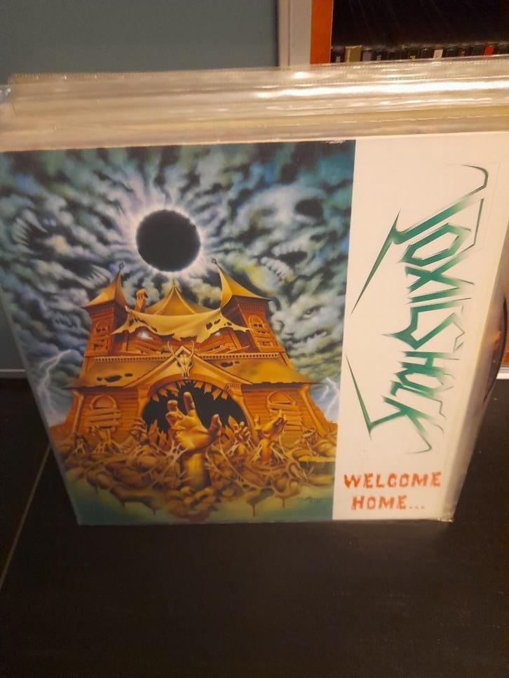lp - toxic shock - welcome home ..near dark, Cd's en Dvd's, Vinyl | Hardrock en Metal, Gebruikt, Ophalen of Verzenden