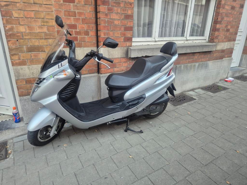 Sym joyride 125cc als nieuw 1100€, Fietsen en Brommers