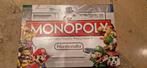 Monopoly Nintendo gezelschapsspel, Hobby en Vrije tijd, Vijf spelers of meer, Ophalen of Verzenden, Zo goed als nieuw, Hasbro gaming