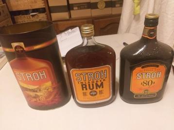 2 verschillende flessen + blikken doos Stroh Rum beschikbaar voor biedingen