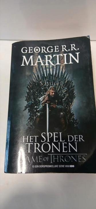 George R.R. Martin - Het spel der tronen, Boeken, Fantasy, Zo goed als nieuw, Ophalen of Verzenden