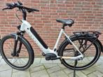 Gazelle met Bosch middenmotor, Fietsen en Brommers, Ophalen, Zo goed als nieuw, 50 km per accu of meer, 55 tot 59 cm