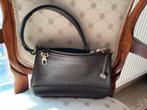 Petit sac Delvaux, Ophalen, Gebruikt