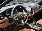 BMW 330e xDrive Touring M-Sport PRO - 12 Mnd Garantie, Auto's, BMW, Automaat, 42 g/km, Euro 6, Blauw