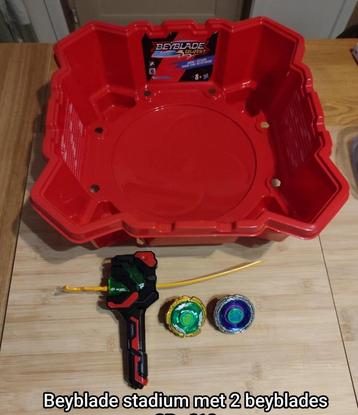 2 beyblades met gratis stadium beschikbaar voor biedingen