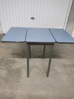 Multifunctioneel uitklapbaar tafeltje, Enlèvement