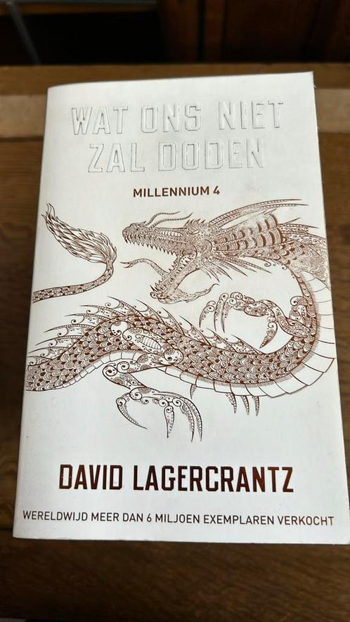 David Lagercrantz - Wat ons niet zal doden, Boeken, Thrillers, Zo goed als nieuw, Ophalen of Verzenden