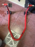 Paddock voor en achter, Motos, Enlèvement